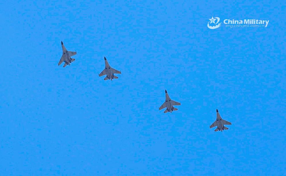 Fighter jets fly in formation