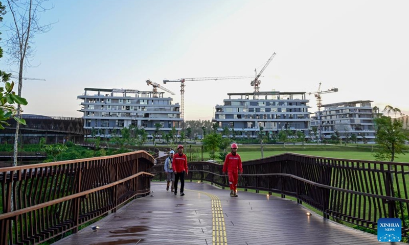 Workers walk near a construction site in the new capital Nusantara located in Kalimantan Island, Indonesia, July 28, 2024. Photo: Xinhua