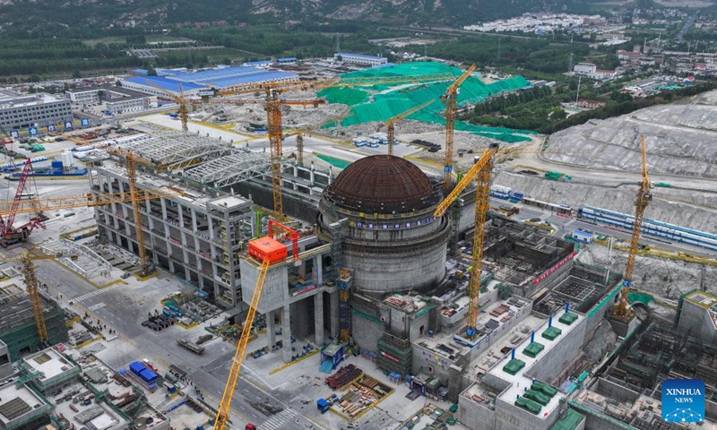 A drone photo shows the Tianwan Nuclear Power Station Unit 8 under construction in Lianyungang, east China's Jiangsu Province, June 19, 2024. Unit 7, as well as Unit 8, has a capacity of 1.265 million kilowatts. And once completed, the two units are estimated to generate about 18.8 billion kilowatt-hours of electricity every year. Started on May 19, 2021, the construction of these two units has gone smoothly.(Photo: Xinhua)