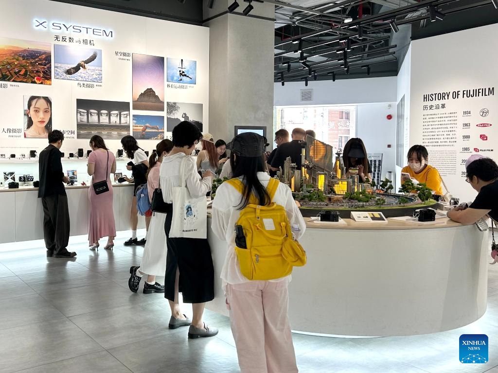 Snap, share, sell: influencer economy revives camera market in China