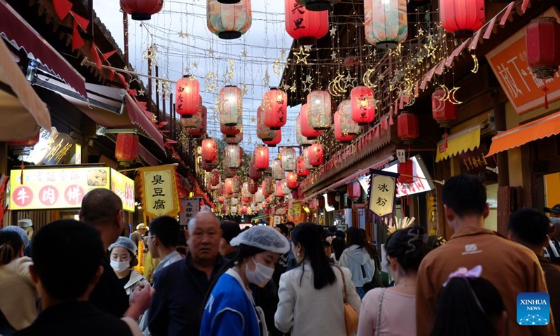 Tourists visit the ancient city of Tianshui in Qinzhou District of Tianshui City, northwest China's Gansu Province, May 1, 2024. Traffics have surged at tourist attractions throughout the country during the 5-day May Day holiday beginning on May 1. Photo: Xinhua