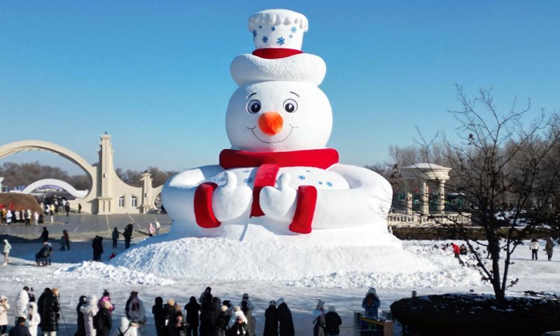 An iconic giant snowman welcomes visitor at the 37th Harbin Sun Island International Snow Sculpture Art Expo in Harbin, northeast China's Heilongjiang Province, Dec. 8, 2024. (Photo: ecns.cn)