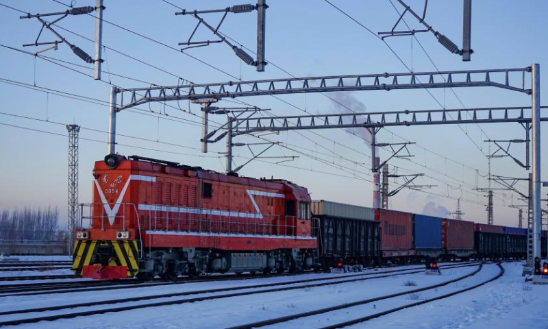 A China-Europe freight train bound for Kazakhstan passes through Horgos railway port in Horgos, northwest China's Xinjiang Uygur Autonomous Region, Dec. 25, 2024. Horgos Port, a major railway hub in Xinjiang, has facilitated 8,541 China-Europe freight train trips by Dec. 24 this year, according to statistics from the railway department of Horgos Port. (Xinhua/Jin Bowen)