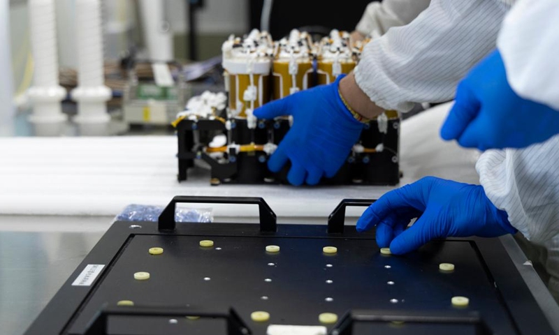 Technicians pack the battery pack of the Solar wind Magnetosphere Ionosphere Link Explorer (SMILE) at a workshop of the Innovation Academy for Microsatellites of Chinese Academy of Sciences (CAS) in Shanghai, east China, Nov. 4, 2024. (Photo: Xinhua)