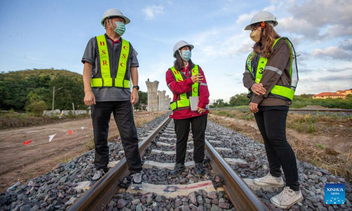 Pannaros Boonserm (C), a translator at the China-Thailand railway construction project, works at a construction site of the China-Thailand railway in Nakhon Ratchasima province, Thailand, Nov 10, 2022. Photo:Xinhua