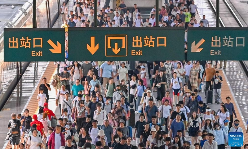 Passengers exit the Harbin Railway Station in Harbin, northeast China's Heilongjiang Province, Aug. 2, 2025. This year's summer travel rush will last for 62 days from July 1 to Aug. 31. From July 1 to 31, China Railway Harbin Bureau Group had handled 9.775 million passenger trips, and the daily average number of passenger trips reached 315,000. Photo: Xinhua