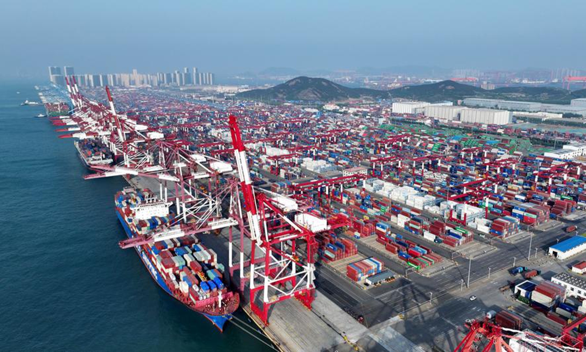 An aerial drone photo taken on April 30, 2025 shows cargo ships berthing at a container dock of Qingdao Port in Qingdao, east China's Shandong Province. This year, Qingdao port has actively expanded its international shipping routes, especially for the Association of Southeast Asian Nations (ASEAN). Photo: VCG