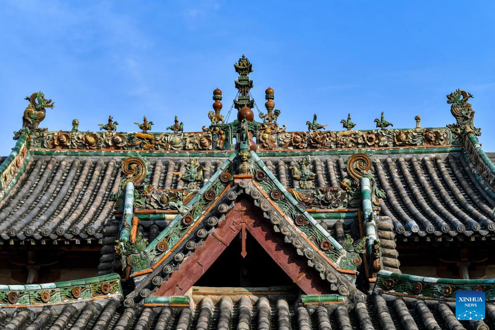 A glimpse of auspicious creatures on rooftops of ancient architecture in China's Shanxi