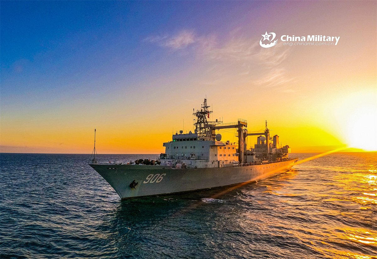 Comprehensive supply ships steam in formation