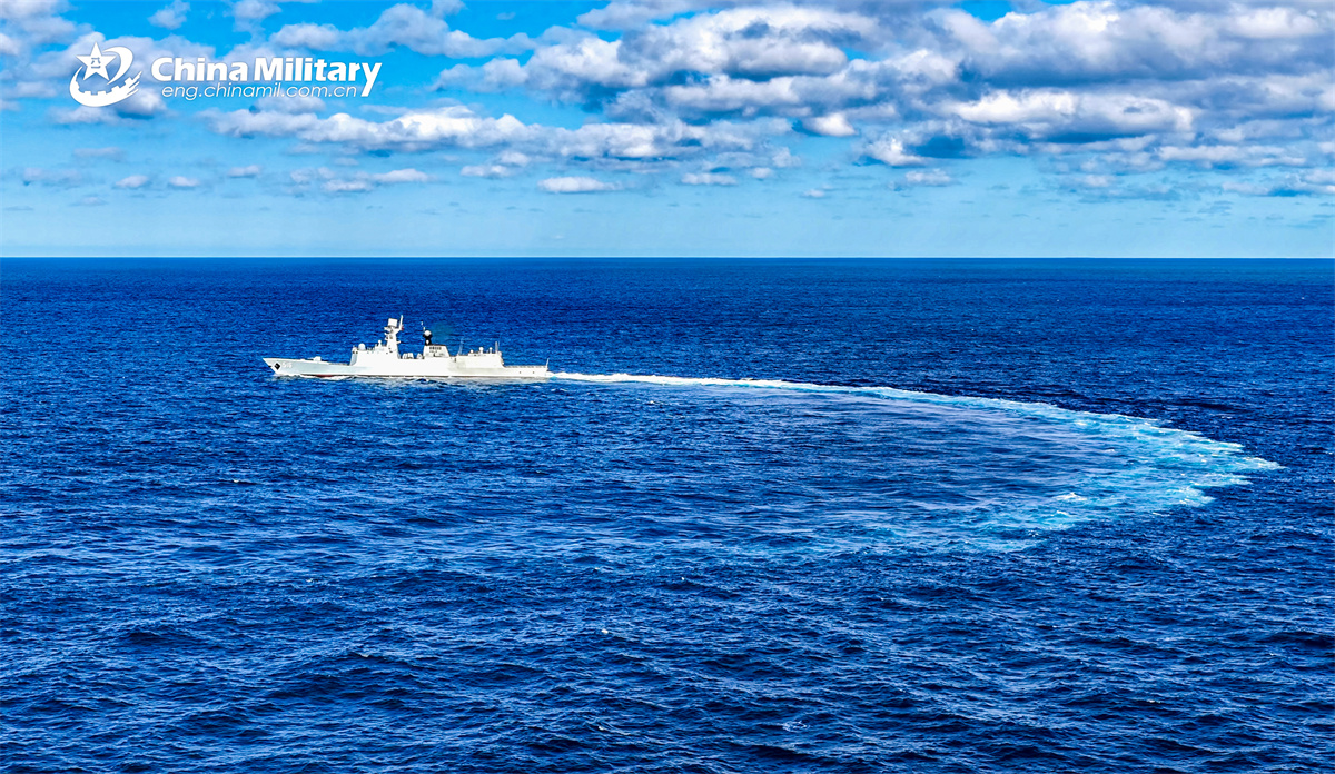 Frigates maneuver at sea