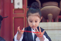Cute young Taoist priest in Beijing