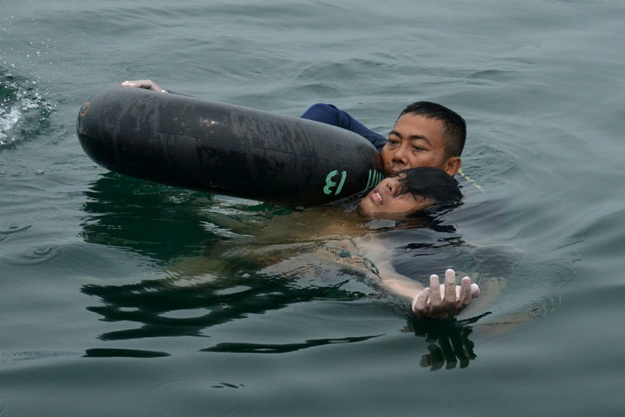 Man who survives air crash saved after floating in lake for two days