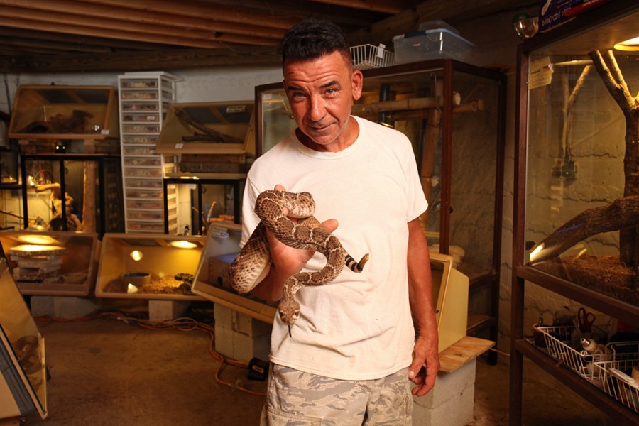 Snake maniac lives with 60 snakes
