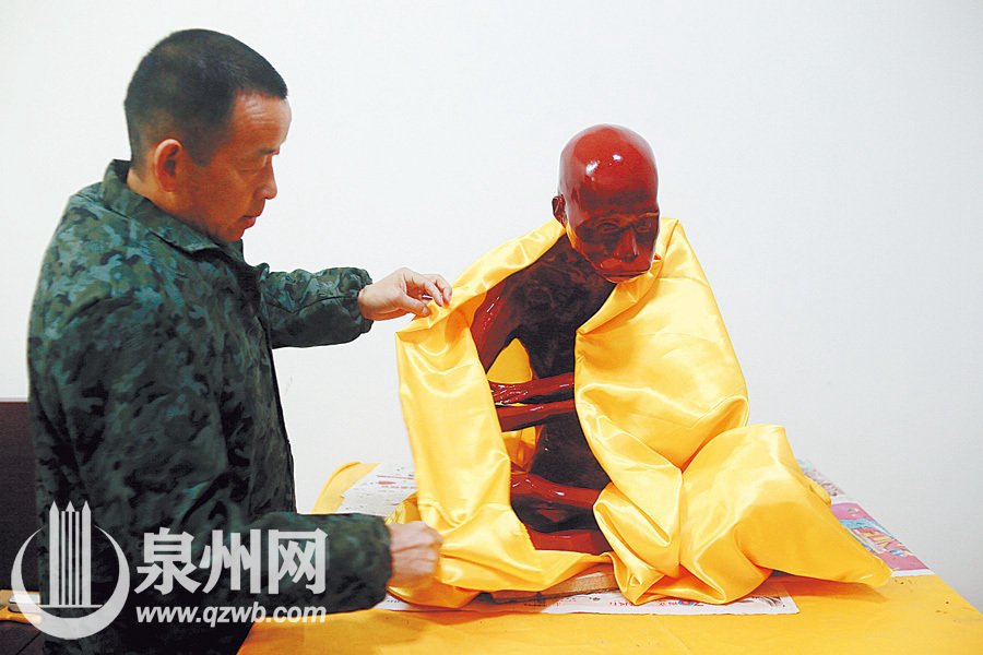 Monk's mummified body to be made into a gold Buddha statue