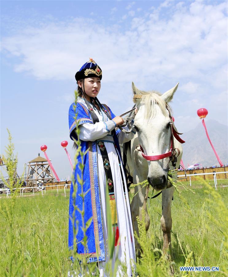 Nadam Fair held to celebrate harvest with sports in Inner Mongolia