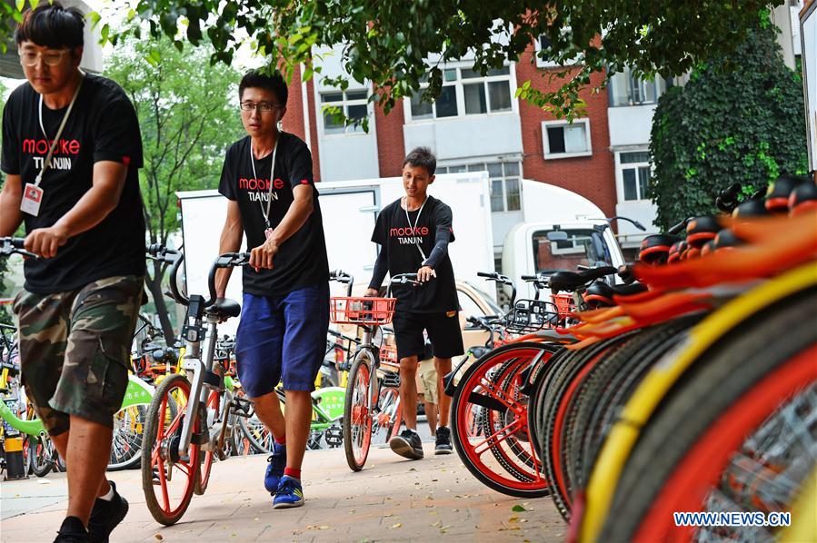 Dispatchers of shared bikes in China's Tianjin