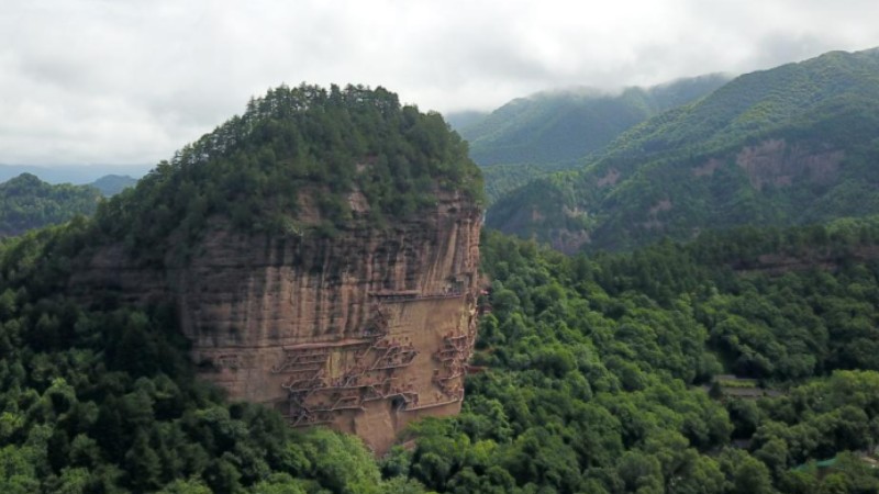 People visit Maijishan Grottoes in Tianshui City, NW China