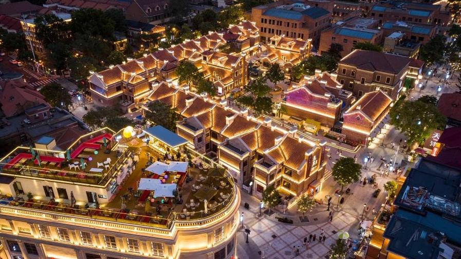 Tourists enjoy leisure time at Wudadao historical urban area in N China's Tianjin