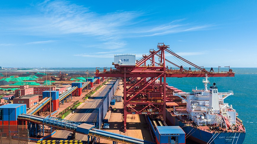 Tangshan Port in N China's Hebei bustles with cargo operations