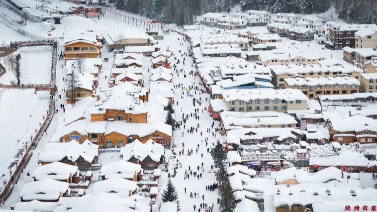 Mesmerizing winter scenery draws crowds to China's 'Snow Town'