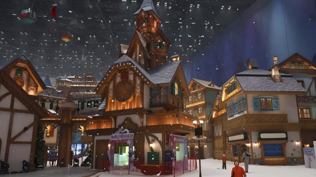 People enjoy themselves at indoor ice and snow world in Shanghai