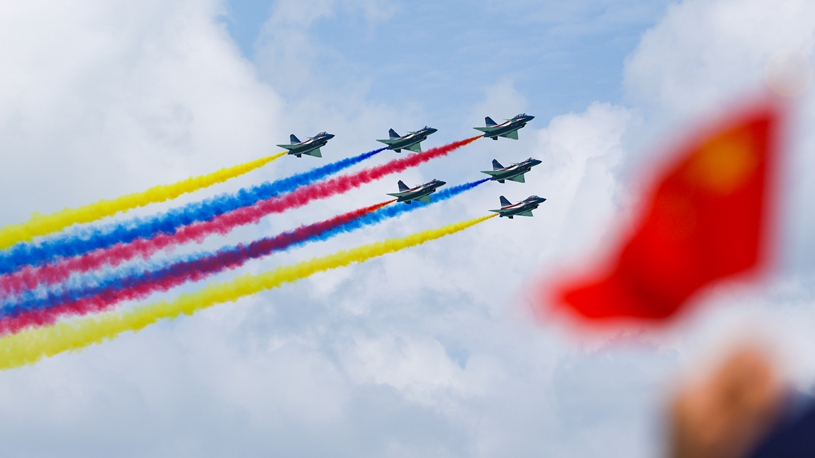 Chinese PLA aerobatic team performs during 10th Singapore Airshow