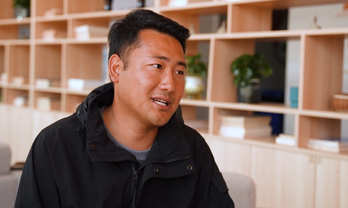 Decoding China: People's democracy embodied in transformation of once-isolated village