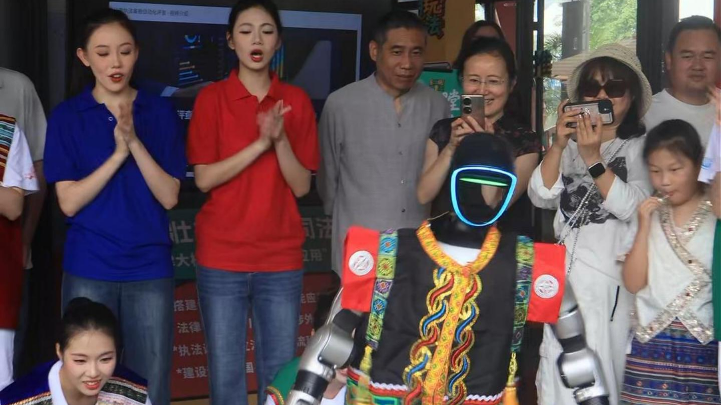 Robot performs bamboo pole dance during traditional Sanyuesan Festival in S China's Guangxi