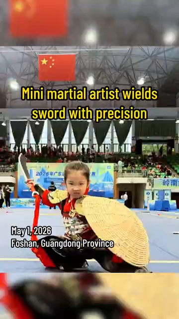 Mini martial artist wields sword with precision