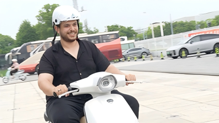 Embracing green mobility: Int'l journalists test ride Yadea's e-scooters