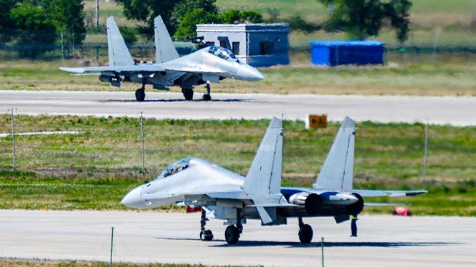 J-16 fighter jet soars into sky