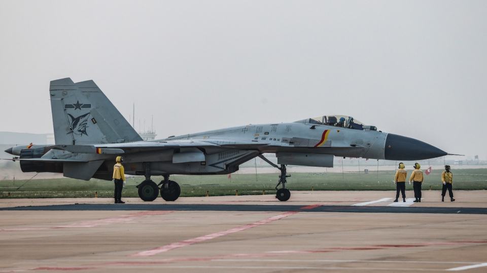 PLA Naval Aviation University conducts carrier-based aircraft launch and recovery drill