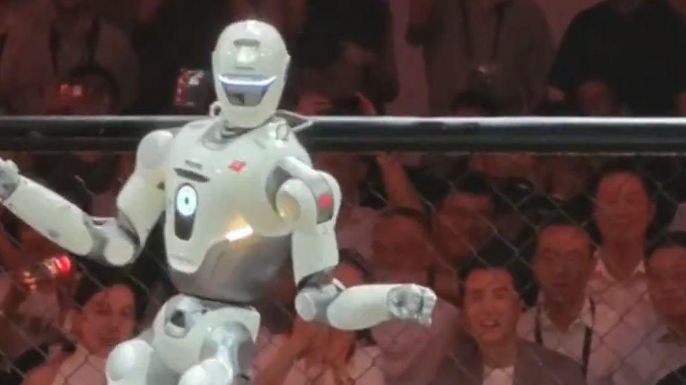 Robot struts its stuff with cheeky victory dance after knockout win