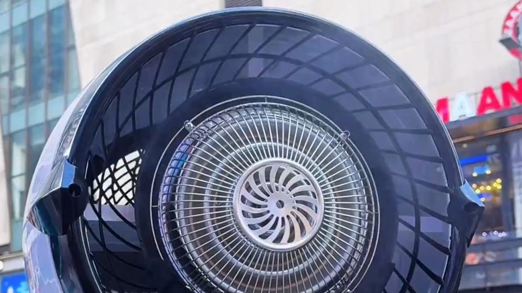 Giant fans bring cool relief to sweltering streets of Chongqing