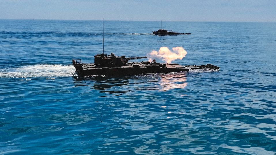 Amphibious armored vehicles dash to beachhead