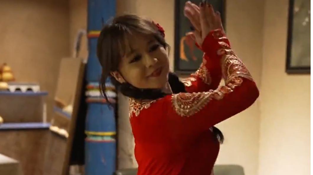 Uygur dancer spins with grace and passion in Hami