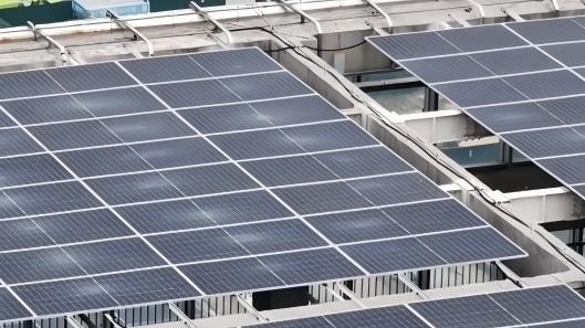 Rooftop solar panels power office buildings in Zhengzhou