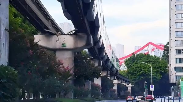Light rail emerges from underground and glides through Chongqing
