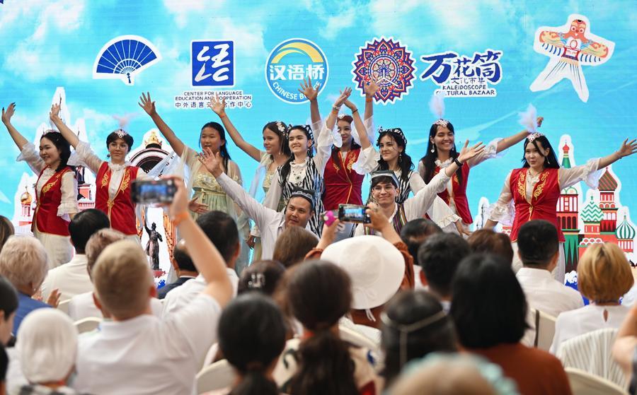 Young students from the Shanghai Cooperation Organization (SCO) countries perform during the Kaleidoscope Cultural Bazaar in north China's Tianjin, Aug. 6, 2025. (Xinhua/Li Ran)