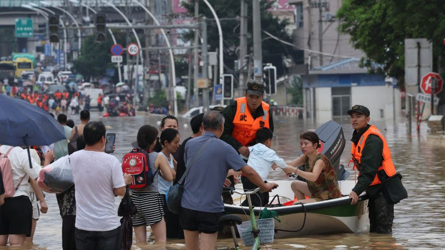 Stranded people rescued following torrential rains in Putian City, SE China's Fujian