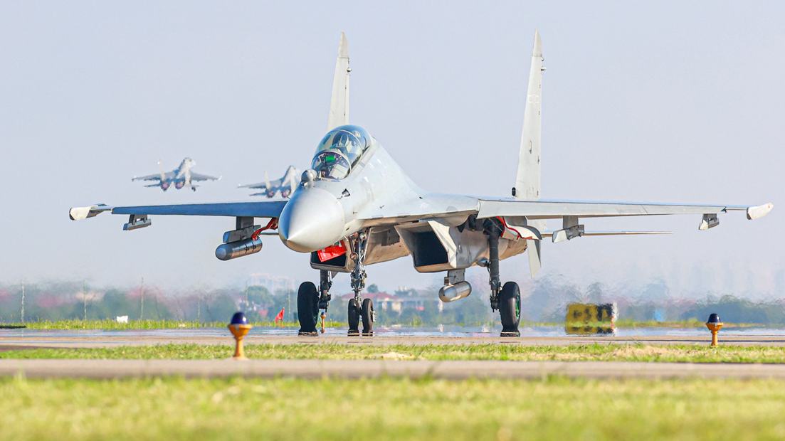 J-16 fighter jets engage in flight training