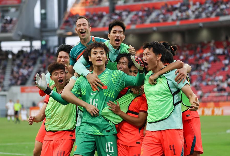 Players of China celebrate after winning the men's 3rd place match of Football between China and Uzbekistan at 20th Asian Games Aichi-Nagoya 2026 in Toyota of Aichi Prefecture, Japan, Oct. 3, 2026. (Xinhua/Jia Haocheng)