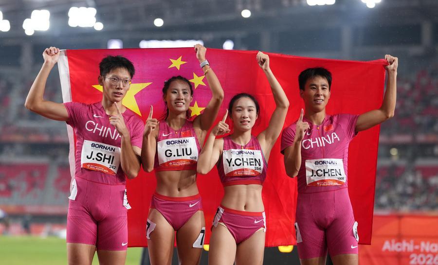 Shi Junhao, Liu Guoyi, Chen Yujie and Chen Jinfeng (L to R) of team China celebrate after the 4x100m relay mixed final of Athletics at the 20th Asian Games Aichi-Nagoya 2026 in Nagoya, Japan, Sept. 29, 2026. (Xinhua/Lui Siu Wai)