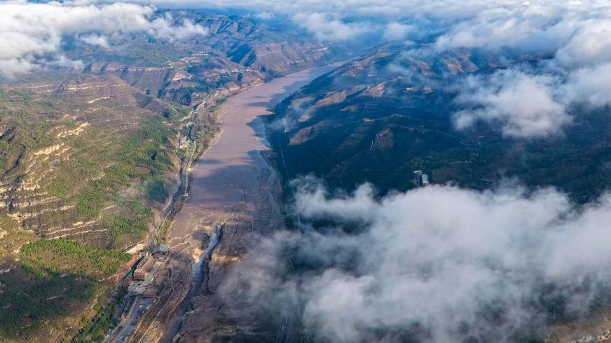 Sea of clouds seen above Yellow River's Hukou Waterfall in China's Shanxi