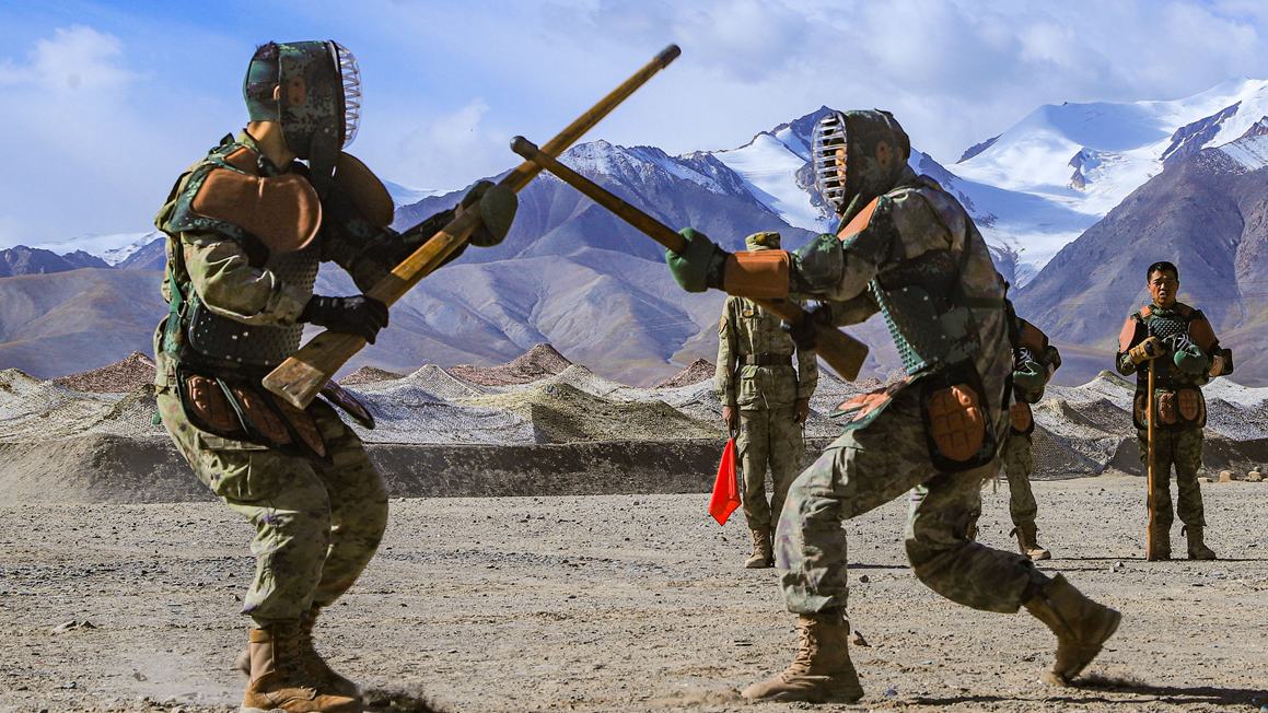 Army soldiers practice bayonet fighting skills