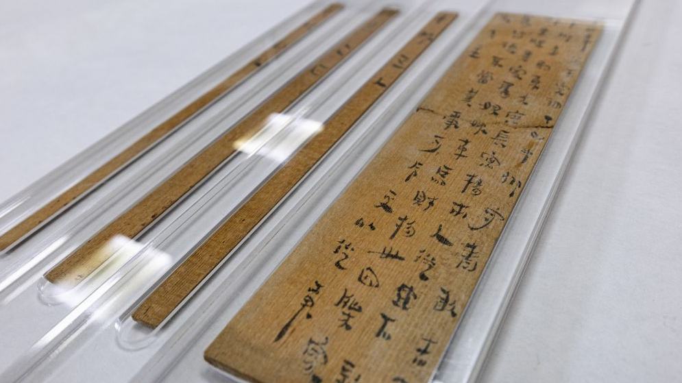 Conservators breathe new life into ancient relics in China's Hubei